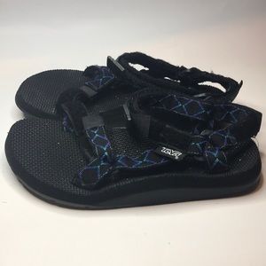 Teva purple and black women’s size 7 scandals